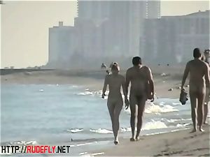 voyeurism at a super-hot naturist duo on the beach
